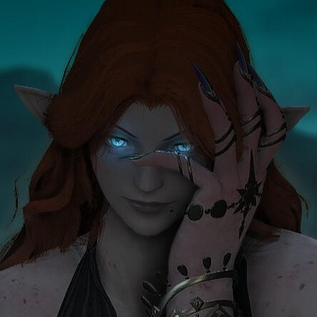 A headshot of Circe. She's in an elezen body with pale skin, copper hair, and glowing blue eyes.